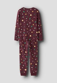 Maroon pajama set featuring a long-sleeve top and pants, decorated with festive patterns including trees, snowflakes, and gingerbread.
