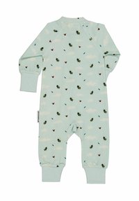 Ljusgrön långärmad jumpsuit i mjukt tyg, med ett mönster av bin och fjärilar mot en molnig bakgrund.