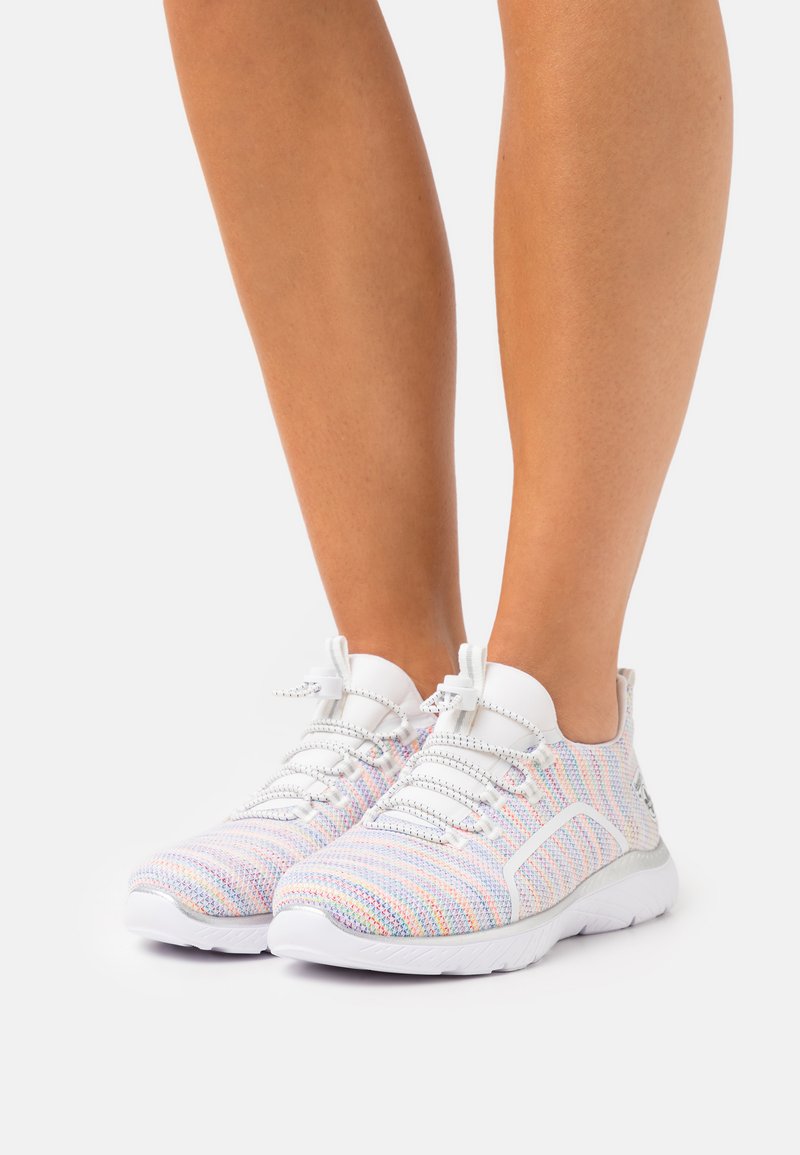White athletic shoes with a multi-colored knit upper, featuring elastic laces and textured soles for enhanced grip.