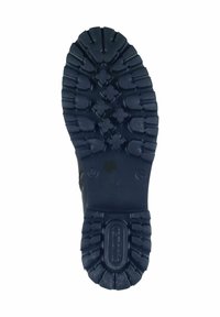 Semelle en caoutchouc noir avec des profondeurs et des motifs circulaires, présentant un design de crampons pour une traction et une stabilité accrues. Taille 37 marquée sur le c�ôté.