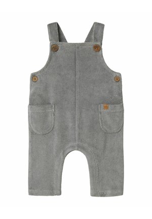 Graue Frottee-Overall mit vorderen Taschen, Holzknöpfen und Trägern. Kurze Beine mit abgerundetem Schnitt am Boden. Weiche Textur.