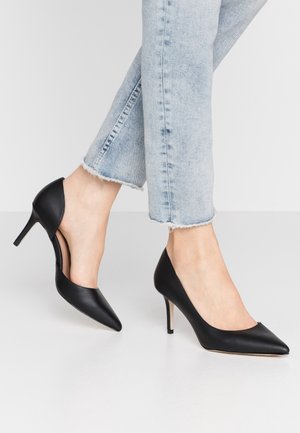 Højhælede pumps - black
