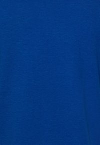 Blue cotton fabric with a smooth texture. Flat weave, no distinct patterns or accents; uniform color throughout.