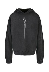 Čierna mikina s kapucňou z mäkkej zmesi bavlny, s kratším strihom. Prednú časť zdobí biele ručne písané písmo. Rúbkované manžety a spodek.