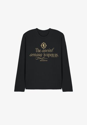Black long-sleeve shirt with gold text reading "The social season is upon us" and "Bridgerton" below a decorative silhouette frame.