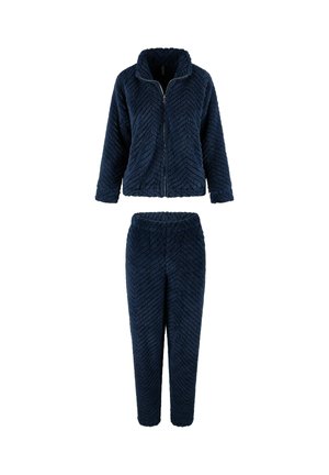 Ensemble de vêtements de détente en polaire bleu marine comprenant une veste zippée avec un col haut et un pantalon assorti à taille élastique, tous deux présentant un motif en chevrons.