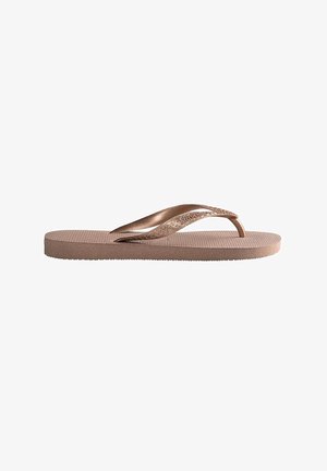 Brown rubber flip-flop with embossed decorative strap, textured footbed, and contoured sole. Lightweight design suitable for casual wear.