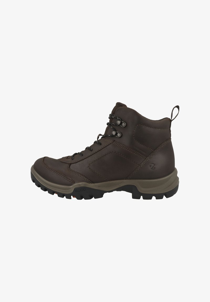 Botte de randonnée en cuir marron avec des lacets noirs, support de cheville rembourré, languette, et semelle épaisse et robuste pour une utilisation en extérieur.