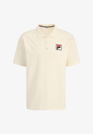 Kermanen polo-paita, joka on valmistettu puuvillasta, varustettuna kolmella napilla ja brodeeratulla logolla vasemmassa rinnassa. Lyhyet hihat.