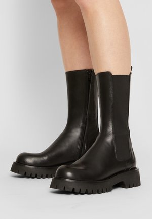 Botas con plataforma - black