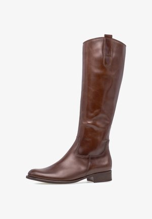 Botte en cuir marron, hauteur genou, avec une finition lisse, un bout arrondi et un petit talon. Comprend une boucle à l'arrière pour un enfilage facile.