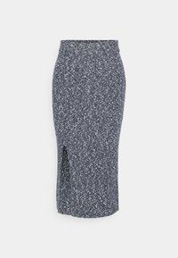 Neulottu kynähame tummansinisen ja valkoisen pilkullisella kuviolla, jossa on sivuhalkio ja istuva vyötärö.