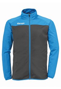 Blau-graue Sportjacke mit Reißverschluss, die kontrastierende Eins�ätze, einen hohen Kragen und das "Kempa"-Logo auf der Brust aufweist.
