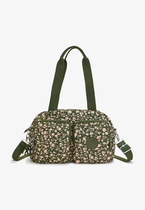 Green shoulder bag with pale pink floral pattern, two front zippered pockets, dual handles, and an adjustable crossbody strap.