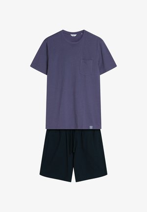 Purple cotton t-shirt with a chest pocket, paired with black drawstring shorts in a lightweight fabric. Both have a relaxed fit.