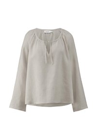 Blusa in lino grigio chiaro con scollatura rotonda e dettaglio a chiave, maniche lunghe e vestibilità morbida. Tessuto morbido e testurizzato.