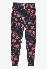 Λουλουδάτες κολάν με μαύρη βάση, διακοσμημένα με μεγάλες ροζ και κόκκινες τριανταφυλλιές και πράσινα φύλλα. Φτιαγμένα από μαλακό, ελαστικό υλικό με ελαστική μέση.