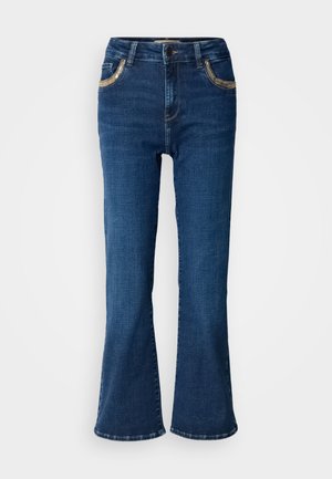Dark blue flared jeans with a smooth denim texture, contrasting golden stitching, and front pocket accents. Classic five-pocket design.