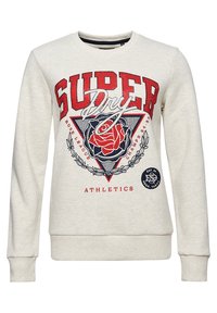 Jasnobeżowy sweatshirt z czerwonym napisem "SUPER", niebieską i czerwoną grafiką róży w trójkącie oraz napisem "ATHLETICS" wydrukowanym poniżej.