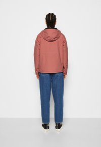 Carhartt WIP NIMBUS - Veste coupe-vent - misty blush