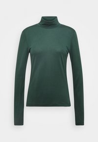 Dunkelgrünes Langarm-Turtleneck-Oberteil aus weichem, glattem Material. Figurnaher Schnitt mit minimalen Nähten und einer gleichmäßigen Textur.
