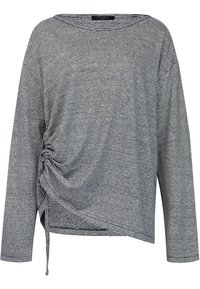 Striped long-sleeve shirt in grey and white, featuring a loose fit, boat neckline, and a gathered side detail with drawstring.