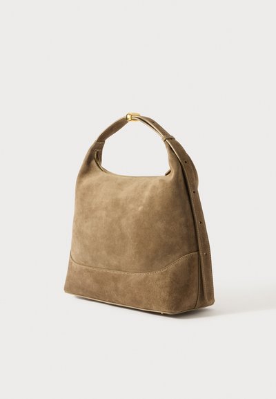 Brown suede handbag with a rounded shape, slim handle, and a subtle seam detail along the base. Features a gold-tone clasp.