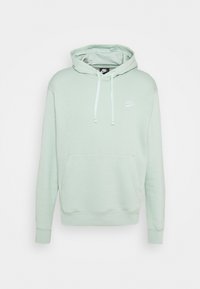 Ljusgrön hoodie i bomullsblandning med kenguruficka, ribbade muddar och en vit Nike-logotyp på bröstet. Justerbar huva med dragsko.