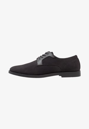 YOURTURN, Derbies & Richelieus - black