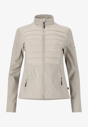 Lys beige jakke med høj krave, lynlås foran og quiltet øverste del. Har sidelommer og glat stof med en mat finish.