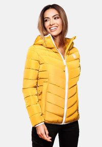 Yellow padded jacket with a hood, featuring a white zipper, chevron stitching, and side pockets. Soft texture and lightweight design.