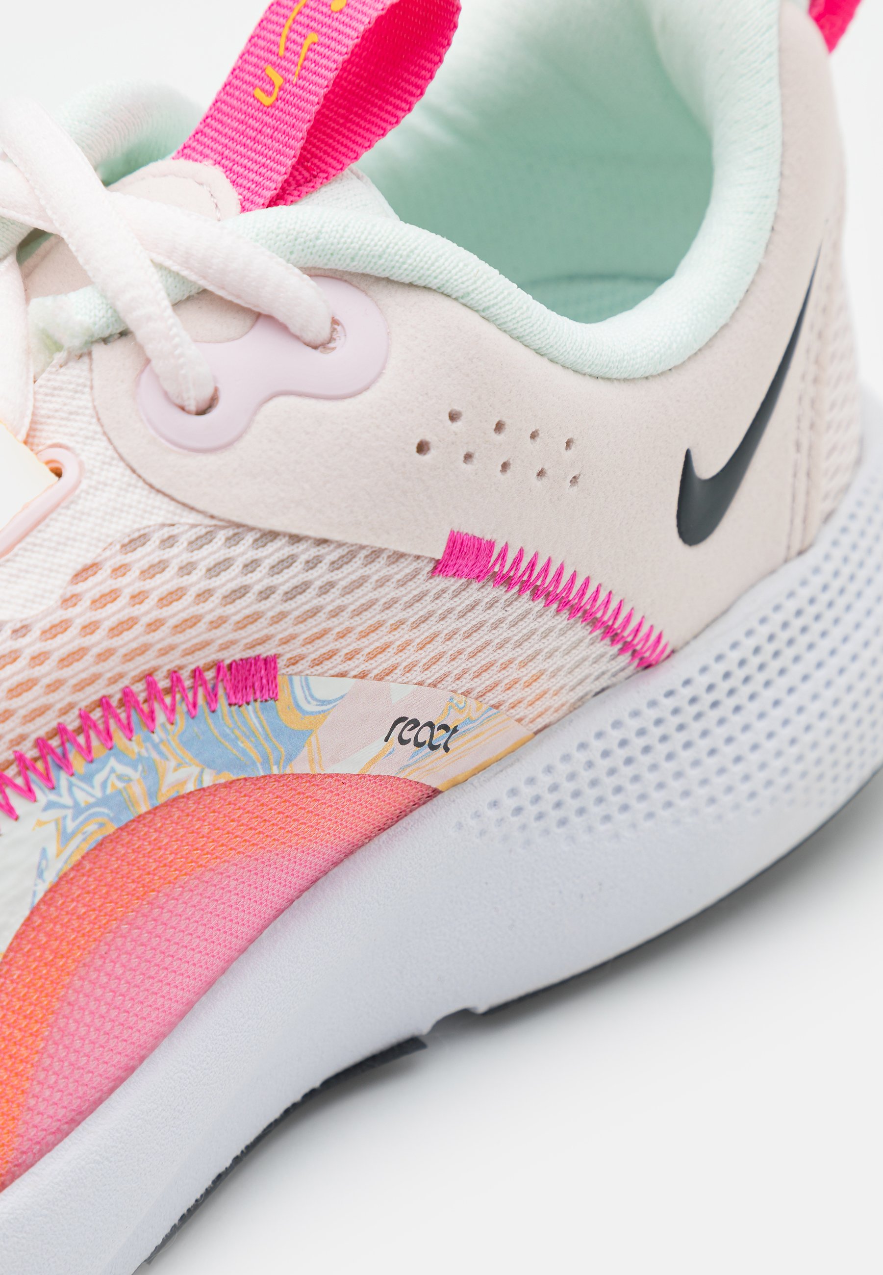 pink and gold tennis shoes