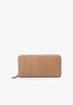 Rectangular tan leather zip-around wallet with subtle brand logo centered on front and circular leather zipper pull tab on left side.