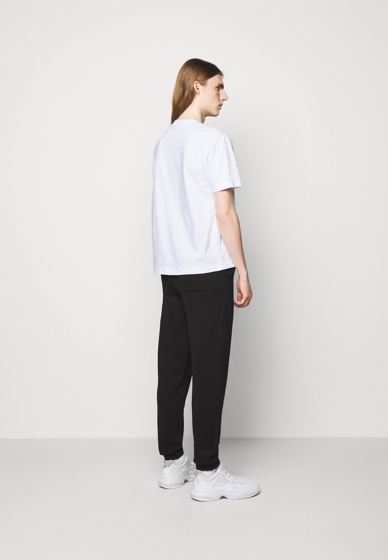 Herren T-shirts & Polos | Holzweiler HANGER TEE T-Shirt basic white/weiß - YD31233 Herren T-shirts & Polos | Holzweiler HANGER TEE T-Shirt basic white/weiß - YD31233