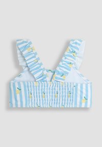 Sininen raidallinen bralette, jossa on röyhelöillä varustetut olkaimet, ja siinä on sitruunakuosi sekä rypytetty pinta yläosassa.