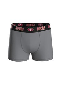 Bóxer ajustado gris con una cinturilla negra que presenta el texto y logo "49ERS" en rojo y blanco. Textura suave con un diseño elegante.