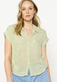 Bluza z gumbi - mint green
