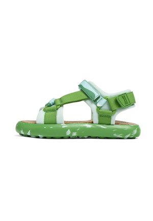 Green sandals with adjustable straps, featuring a textured cork footbed and molded rubber sole with marbled green accents.