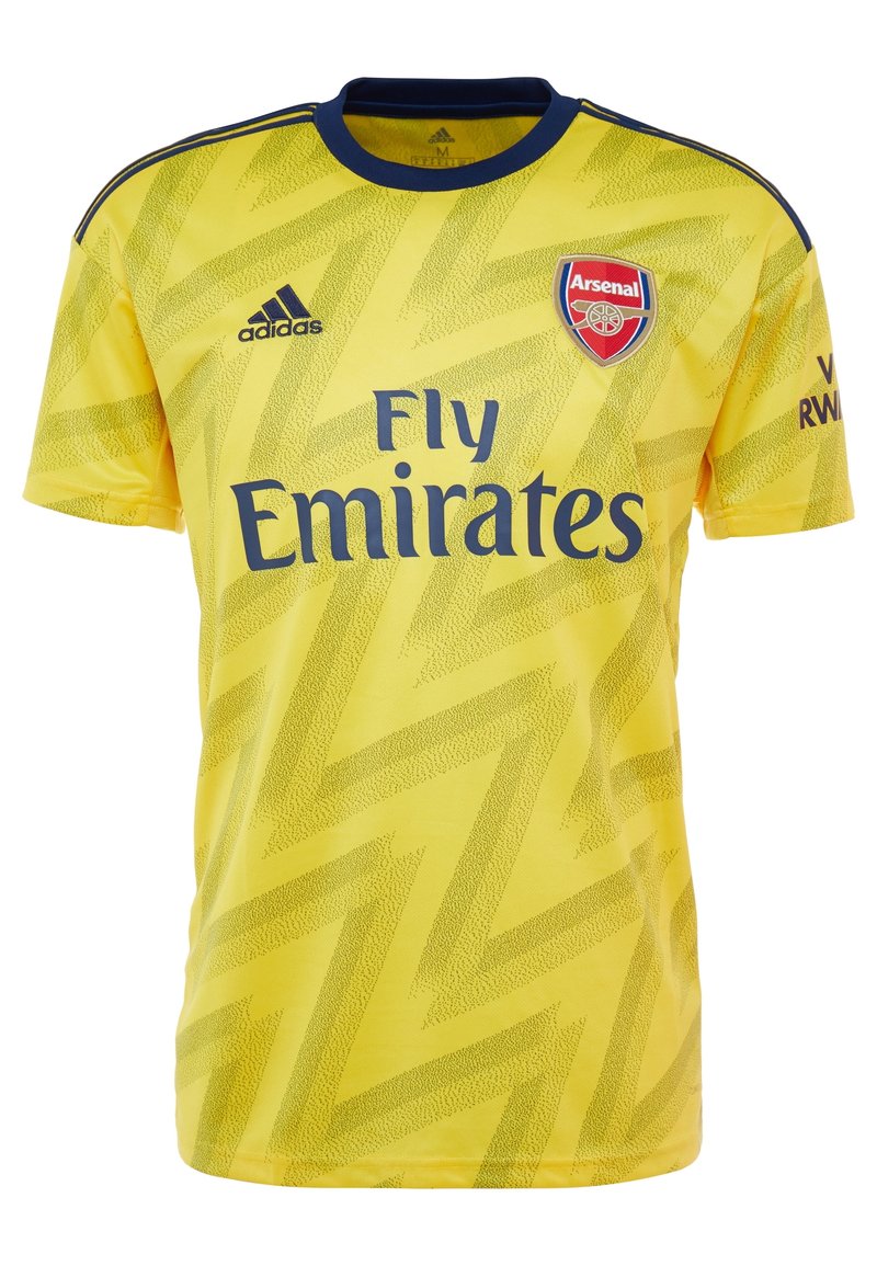 Yellow Arsenal football jersey with blue zigzag pattern, blue collar, Adidas logo, Arsenal crest, and "Fly Emirates" sponsor text.