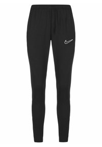 Zwarte Nike trainingsbroek met taps toelopend ontwerp, elastische tailleband en wit logo op de linker dij. Gemaakt van zachte, rekbare stof.