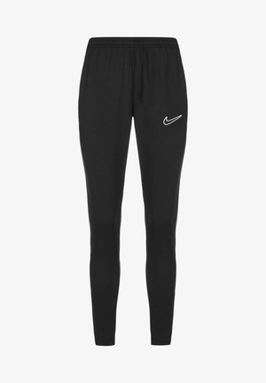 Black Nike sweatpants with a tapered design, elastic waist, and white logo on the left thigh. Made of soft, stretchy fabric.
