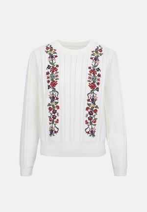 Balta ilgomis rankovėmis megzta palaidinė su vertikaliais megztais raštais ir dviem išsiuvinėtomis gėlių juostomis raudonos, violetinės, geltonos ir žalios spalvų priekyje.