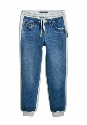Denim joggers with a blue wash, grey jersey side panels, elastic waistband, and ankle cuffs; five-pocket design with a drawstring.