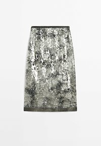 Jupe crayon en sequins argentés, présentant une surface texturée avec un motif de dégradé subtil, et une taille élastique noire unie.