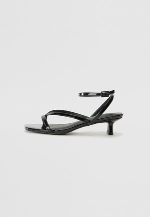 ZORA - T-bar sandals - black