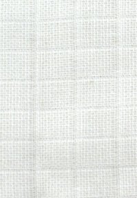 White textured fabric with a grid pattern, featuring a multi-thread weave that creates a subtle grid appearance and a smooth surface.