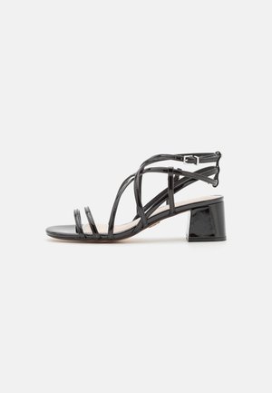 Buffalo CAGE - Sandali - black