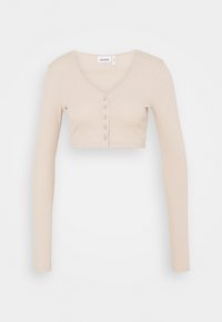 Top court à manches longues beige avec un décolleté en V, comprenant six boutons sur le devant et une texture côtelée. Étiquette de la marque : WEEKDAY.
