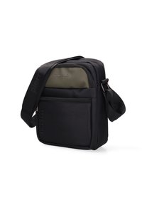 Borsa a tracolla nera con tessuto testurizzato, tasca anteriore verde oliva, doppia cerniera e tracolla regolabile con dettaglio "FREE TIME".