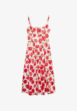 Robe fleurie avec des motifs de coquelicots rouges sur un fond blanc. Comprend des bretelles fines, un corsage ajusté et une jupe évasée. Matière en coton.
